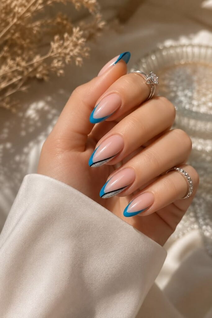 Diagonal Blue French Tips with Silver Glitter Accents
