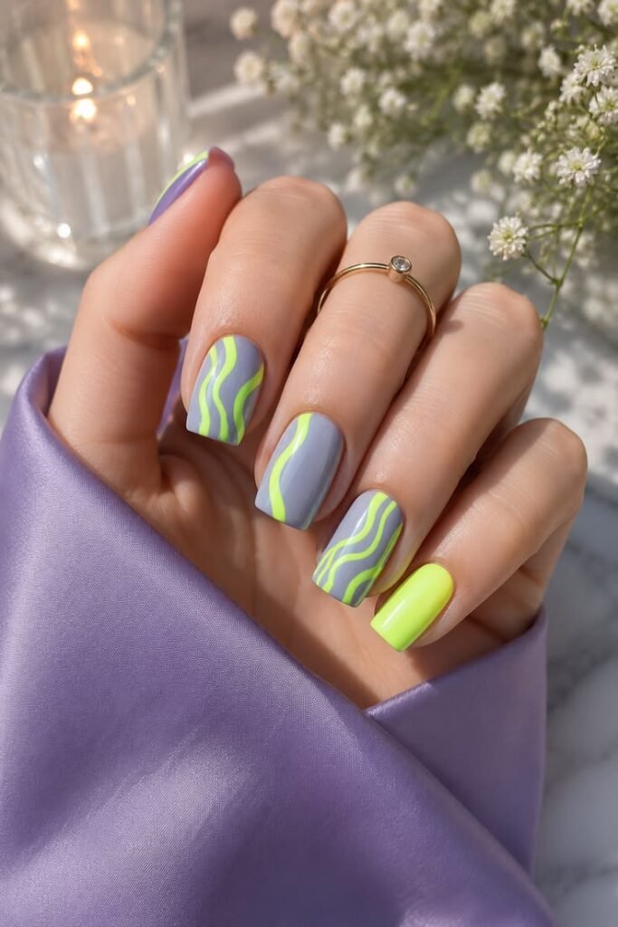 Neon Yellow Swirl Nails With a Grey Base